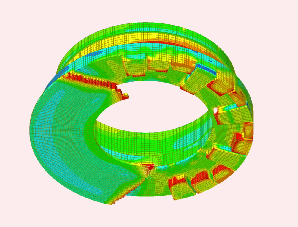 Finite element analysis model of a circular structure, shown as a coloured mesh.
